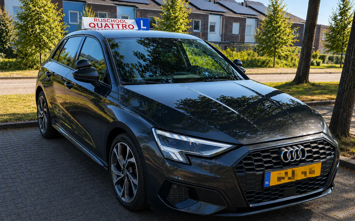 De Audi A3 automaat lesauto van Rijschool Quattro geparkeerd in Amersfoort